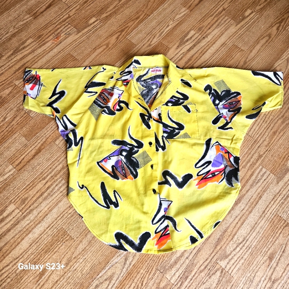 Vintage 80s hot stuff abreact collared tee.